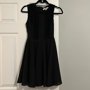 Black dress with detailing on front